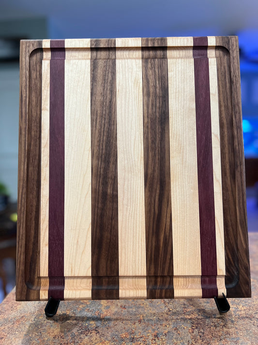 Black Walnut, Purpleheart and Hard Maple side grain cutting board