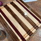 Black Walnut, Purpleheart and Hard Maple side grain cutting board