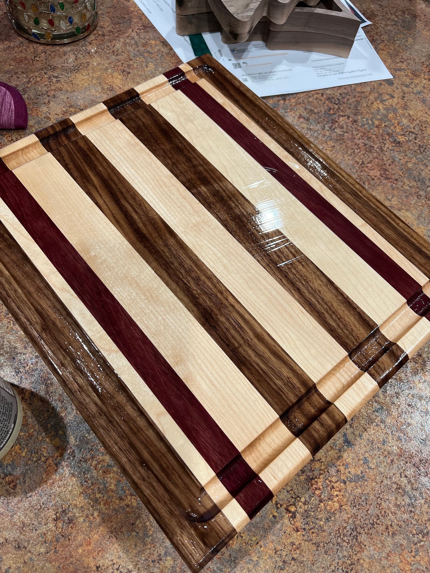 Black Walnut, Purpleheart and Hard Maple side grain cutting board