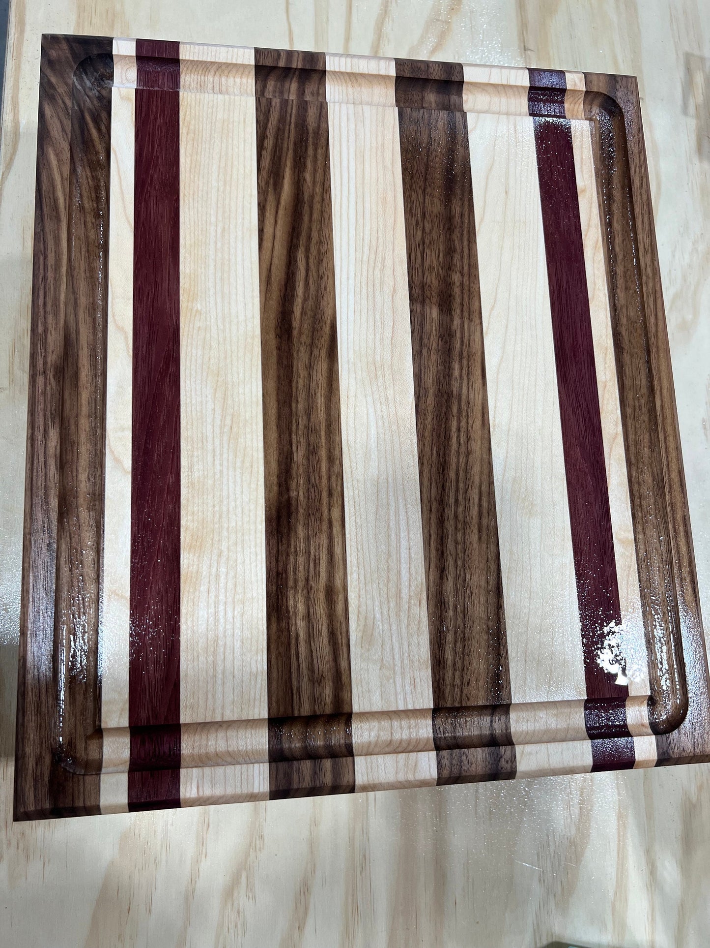 Black Walnut, Purpleheart and Hard Maple side grain cutting board